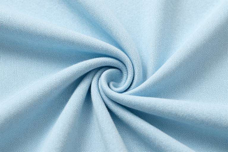 浅蓝色柔软织物螺旋纹理高清摄影特写展示